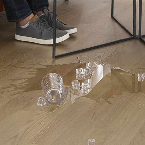 Ice water spilled on a waterproof floor by Pergo