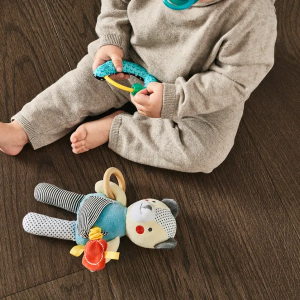 Baby playing on a clean vinyl sheet floor