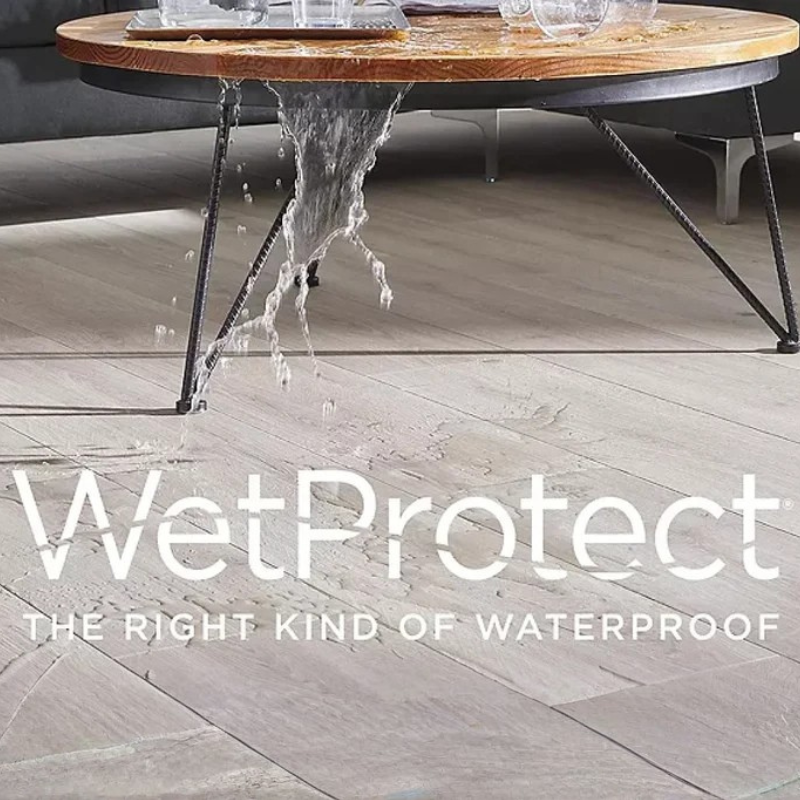 Water spilled on a new RevWood floor featuring WetProtect technology